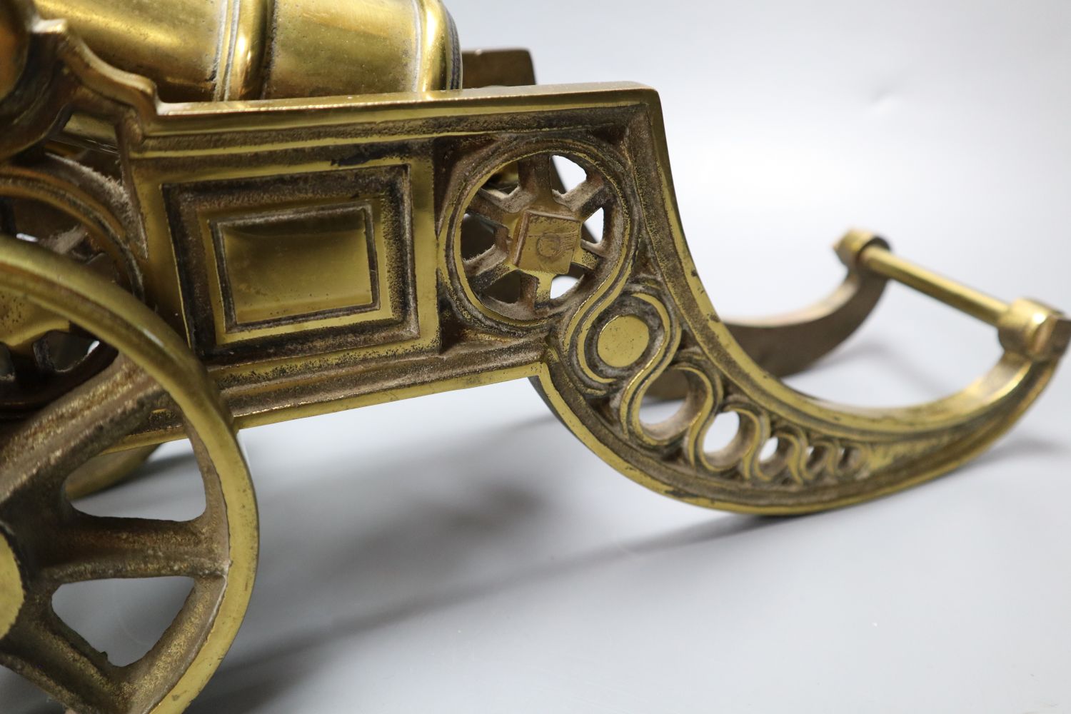A large brass signal cannon on elaborate carriage, length 42cm